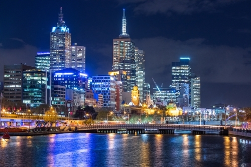 Melbourne City and Yarra River at night with lights shining - Australian Stock Image