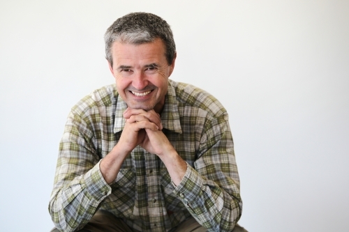 middle-aged man in work clothes - Australian Stock Image