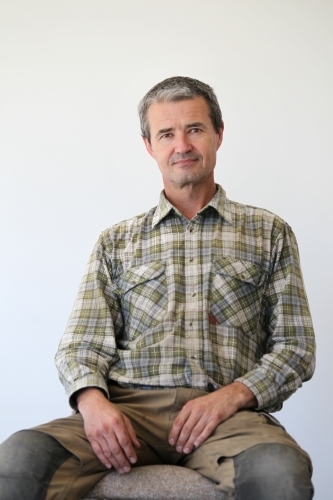 middle-aged man in work clothes - Australian Stock Image