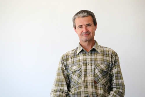 middle-aged man in work clothes - Australian Stock Image