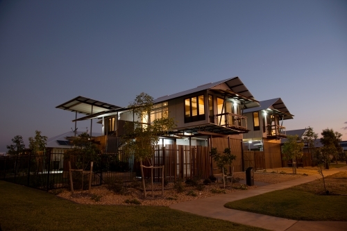 Modern townhouse development at dusk - Australian Stock Image