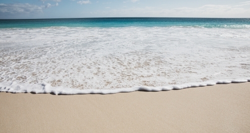 Morning Beach whitewash - Australian Stock Image