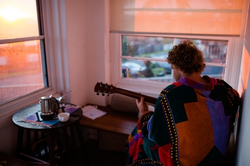 Morning coffee and guitar - Australian Stock Image