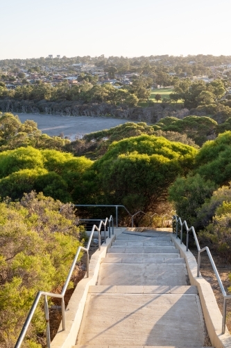 Morning view looking over staircase, parkland and houses - Australian Stock Image