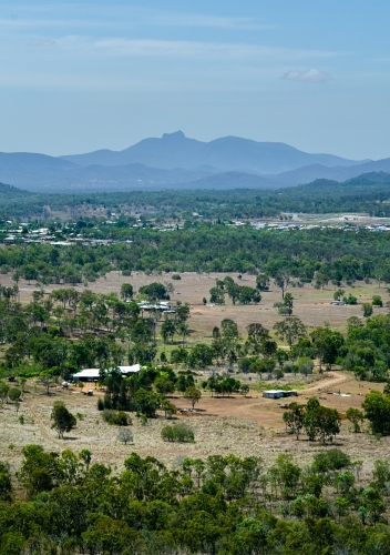 Mount Larcom in hazy light - Australian Stock Image