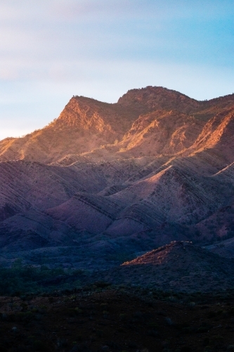 Mountains in early morning light vertical - Australian Stock Image