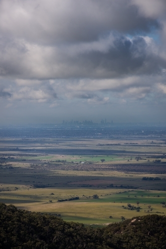 Mountains, Paddocks, and the Melbourne City Skyline. - Australian Stock Image