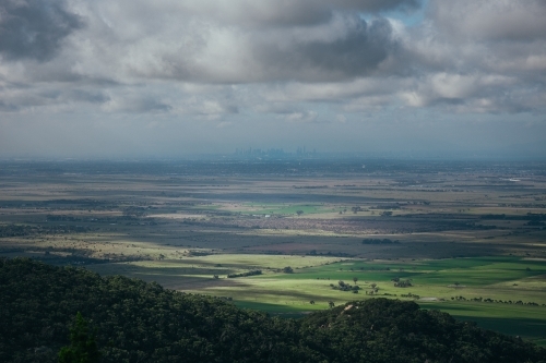 Mountains, Paddocks, and the Melbourne Skyline. - Australian Stock Image