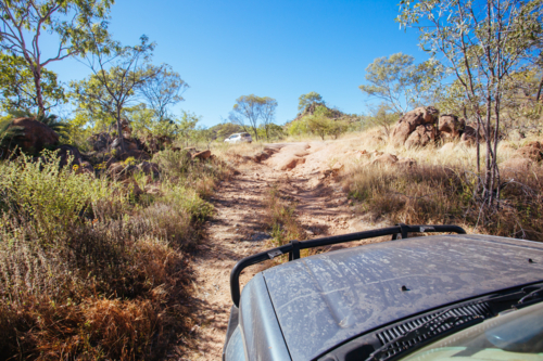 Mt Surprise, Australia - July 6, 2016: A 4WD car negotiating a rural track in the outback - Australian Stock Image