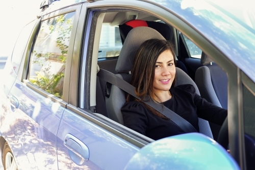 Multicultural Asian woman in the car - Australian Stock Image