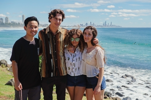 Multicultural teenagers hang out near the beach - Australian Stock Image