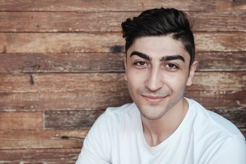 multicultural young adult man, university student - Australian Stock Image