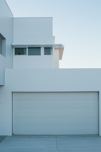 New suburban, clean, modern architecture white exterior, evening light - Australian Stock Image