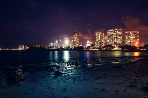 Night shot of buildings over water - Australian Stock Image