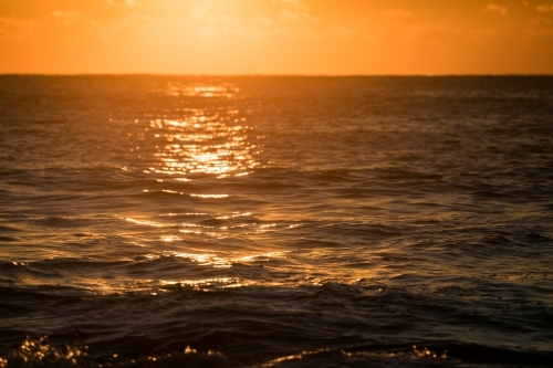 ocean and waves at sunrise