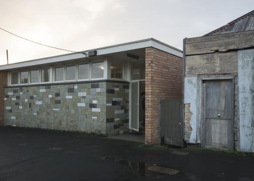 Old buildings along street on an overcast afternoon - Australian Stock Image