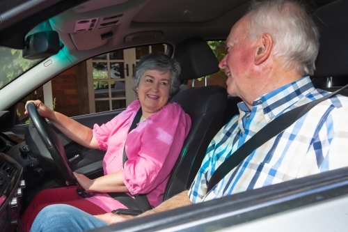 Old couple talking inside their car - Australian Stock Image