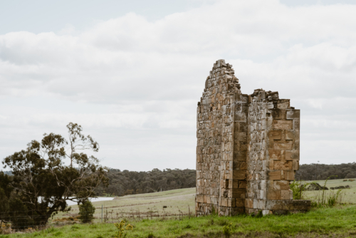 old heritage sandstone house foundation in rural setting - Australian Stock Image