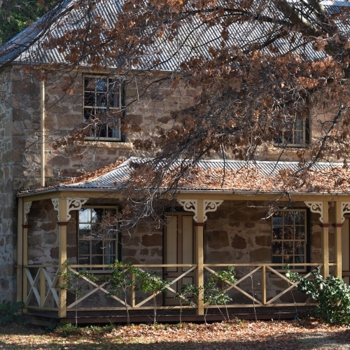 Old rural victorian home with front porch veranda - Australian Stock Image