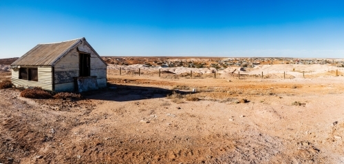 old shed with mining town in background - Australian Stock Image