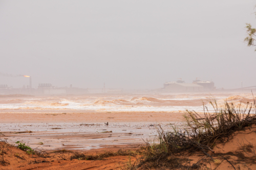 Onslow at end of cyclone Sean, looking towards Chevron Oil and Gas - Australian Stock Image