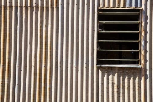 Open window in tin shed - Australian Stock Image