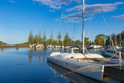 Out of focus blurred image of boats moored at the Brunswick Heads marina - Australian Stock Image