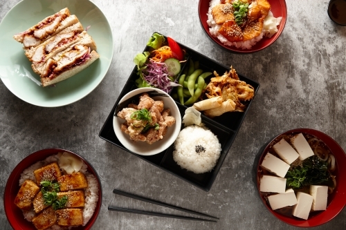 Overhead shot of Japanese dishes on table - Australian Stock Image