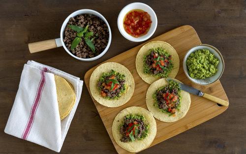 Overhead shot of Mexican style tortillas presented on table - Australian Stock Image