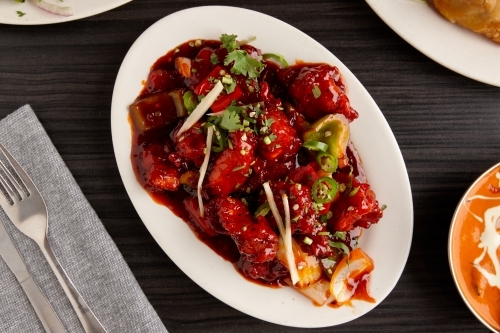 Overhead view of Indian dish on table - Australian Stock Image