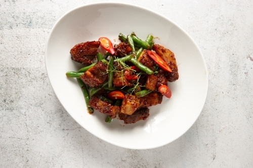 Pad prik khing dish on table - Australian Stock Image