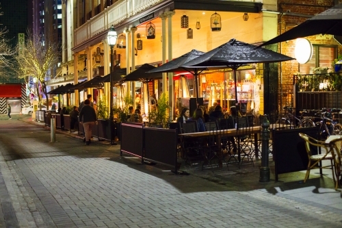 People dining at night - Australian Stock Image