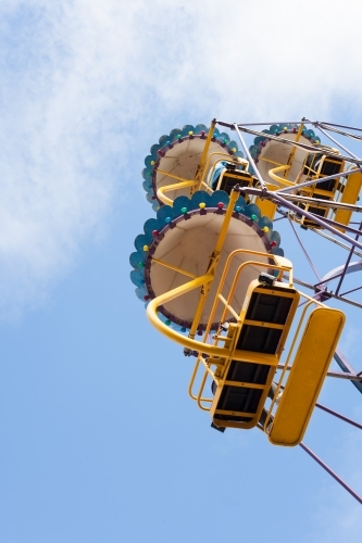 People on a ferris wheel at a city fun park - Australian Stock Image