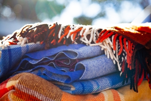 Pile of woolen blankets outside - Australian Stock Image