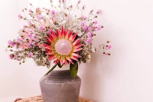 Pink flowers in a vase - Australian Stock Image