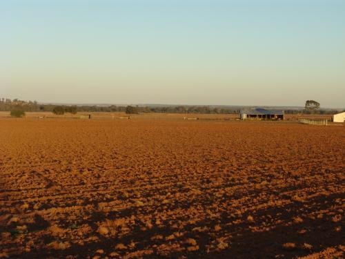 Ploughed paddock of red soil - Australian Stock Image