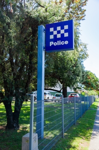 Police sign outside station along the street - Australian Stock Image