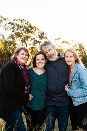 Portrait of a happy family, parents and teenage children - Australian Stock Image