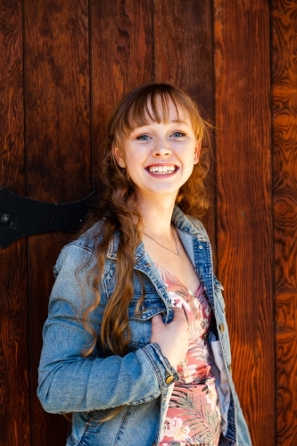 Portrait of a smiling young woman in her late teens - Australian Stock Image