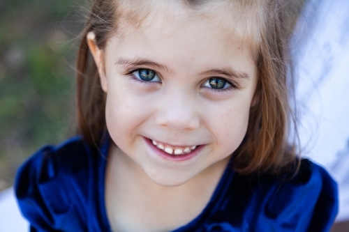 Portrait of a young girl with blue eyes - Australian Stock Image