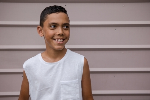 Portrait of a young, smiling first nations boy - Australian Stock Image