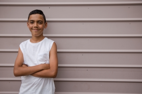 Portrait of a young, smiling first nations boy - Australian Stock Image