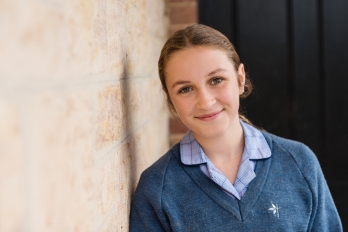 portrait of a young teen in school uniform, with copyspace - Australian Stock Image