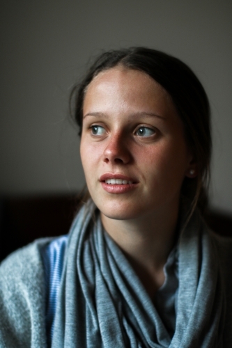 Portrait of a young teenage girl indoors - Australian Stock Image