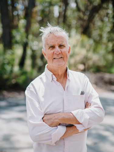 Portrait of Elderly man enjoying a healthy lifestyle in nature - Australian Stock Image