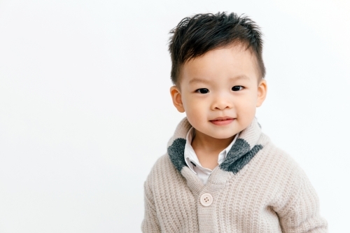 Portrait of gorgeous Asian toddler with copy space - Australian Stock Image