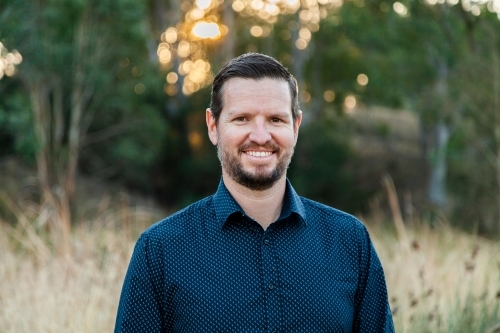 Portrait of well dressed man looking directly at the camera - Australian Stock Image