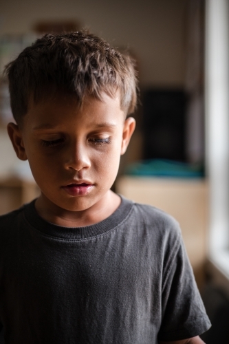 Portrait of young Aboriginal boy - Australian Stock Image