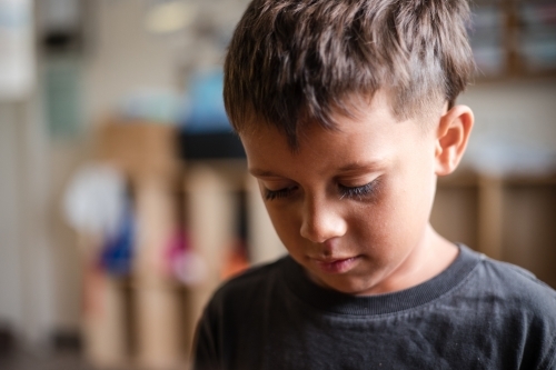 Portrait of young Aboriginal boy - Australian Stock Image