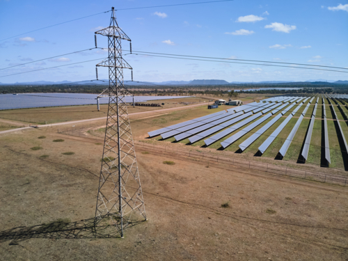 Power pylon & solar farm. - Australian Stock Image